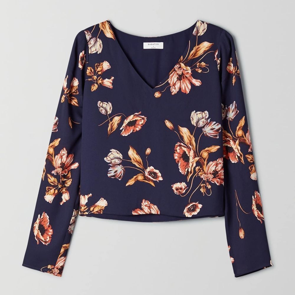 Babaton Navy V-Neck Blouse with Warm Floral Print